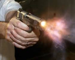 pistola herido